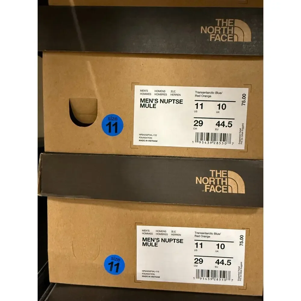 THE NORTH FACE MEN'S 11 NUPTSE MULE TRANSANTACTIC BLUE/RED ORAGE GOOSE DOWN